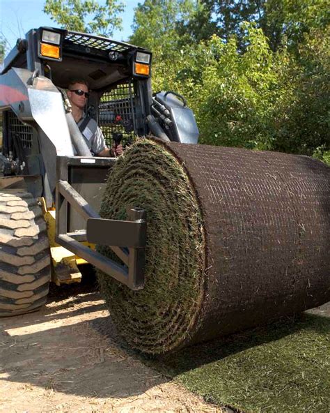 skid steer installing sod|skid steer sod roller.